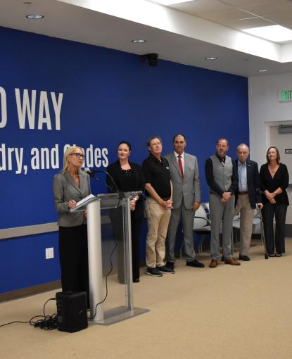 United Way Interim President & CEO Hannah Pelle addresses Press Conference attendees.